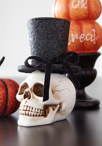 Click Here to buy 5  Resin Skull with Glittery Top Hat from HalloweenCostumes, CDN Funds & Shipping